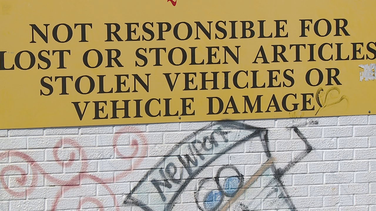 vehicle break-in warning sign